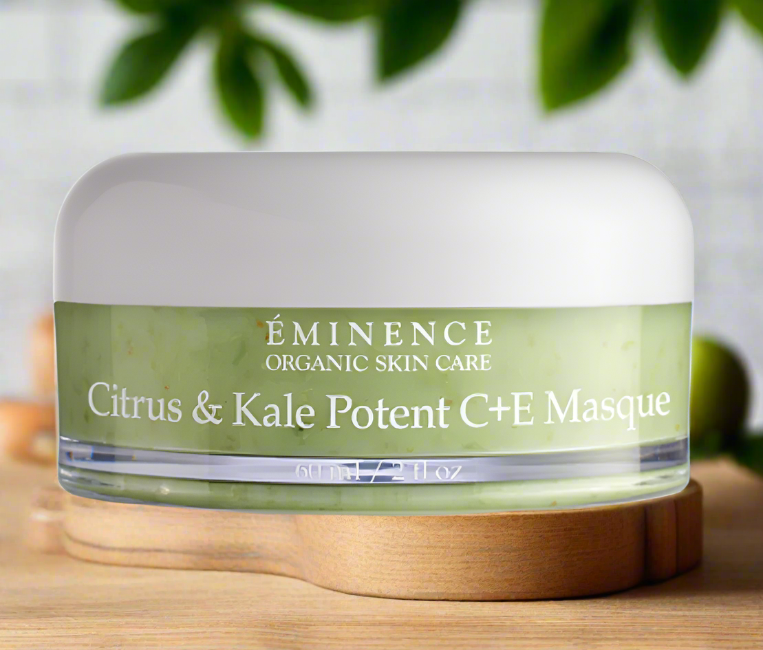 Jar of Éminence Organic Skin Care Citrus & Kale Potent C+E Masque on a wooden surface.