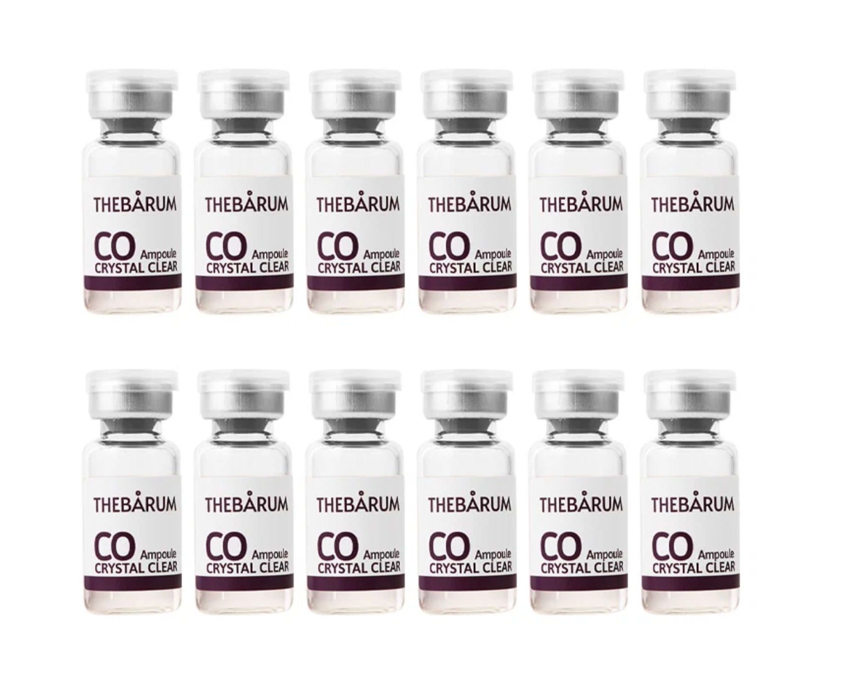 Twelve small glass vials with silver caps arranged in two rows of six on a plain white background. Each vial is labeled THEBÅRUM CO Ampool Crystal Clear.