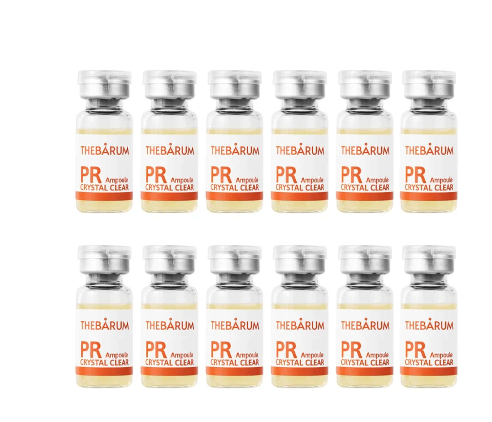 Twelve small clear glass vials with silver caps arranged in two rows of six on a white background. Each vial label reads THEBÁRUM PR Ampoule CRYSTAL CLEAR.