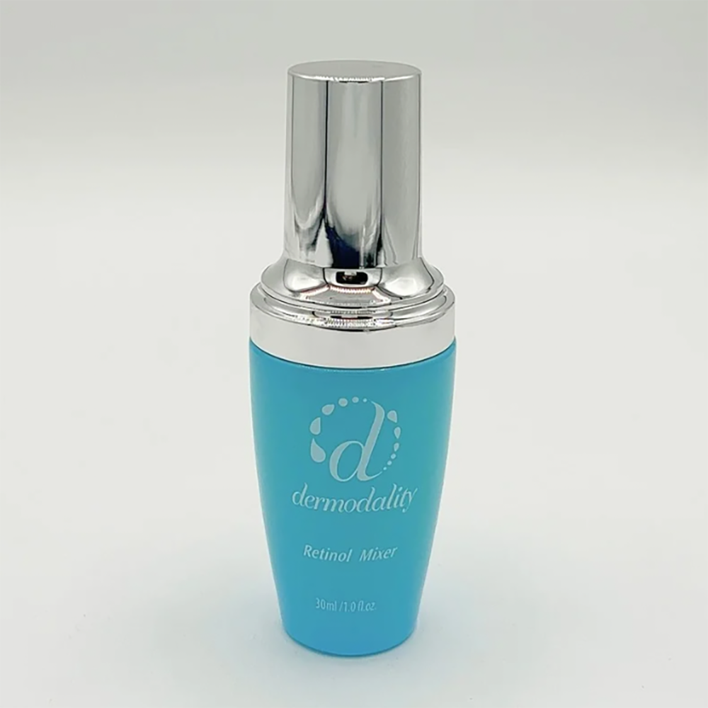 Blue bottle with silver cap on a white background